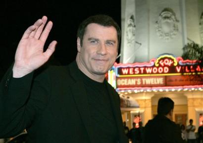 Actor John Travolta arrives at a screening of 'A Love Song for Bobby Long,' in this Monday, Dec. 13, 2004 file photo in the Westwood section of Los Angeles, Calif. [AP/file]