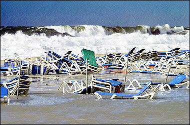 Hammocks almost buried at the beach of Pajara district in Fuerteventura island (Canary Island), southern Spain. Countries all around the Atlantic rim could be hit by killer tsunamis at any time between now and the next 10,000 years, the British government's chief scientific adviser said.(AFP/EPA/EFE/File/Juan Medina) 