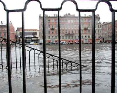 Flood water covers the central street of St.Petersburg, January 9, 2005. Waters of the Neva river rose overnight 2.39 meters above the normal level due to weather conditions in the Baltic Sea. [Reuters]