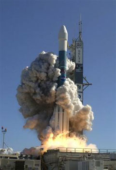 In this photo released by NASA a Delta II rocket carrying the Deep Impact spacecraft lifts off from the Cape Canaveral, Fla. Air Force Station Wednesday, Jan. 12, 2005. Scientists are counting on Deep Impact to carve out July 4 a crater ranging in size anywhere from two to 14 stories deep, and perhaps 300 feet in diameter in Comet Tempel 1. It will be humanity's first look into the heart of a comet, a celestial snowball still preserving the original building blocks of the sun and the planets. [AP] 