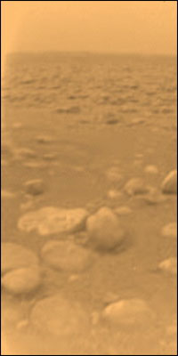 One of the first images returned by the European Space Agency's (ESA) Huygen's probe on Titan. ESA scientists were due to give their analysis of the first pictures of Saturn's moon Titan -- hours after the Huygens spacecraft landed on its surface. [AFP/ESA]