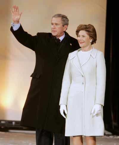 U.S. President George W. Bush and his wife Laura greet supporters at the 55th Presidential Inaugural Committee's "Celebration of Freedom" event in Washington D.C. on January 19, 2005. The event was held ahead of the second inauguration of Bush as 43rd president of the United States on January 20. [Reuters]