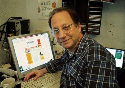 Blogger David Weinberger sits near his computer at his home, in Brookline, Mass., Tuesday, Jan. 18, 2005. Thoough many bloggers don't consider themselves journalists, a few are trying to claim the same protections used by journalists, such as protecting confidential sources. (AP Photo/Steven Senne) 