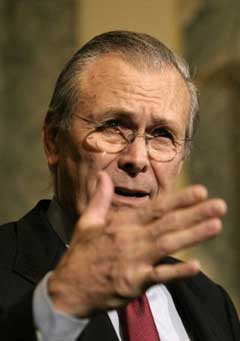 U.S. Secretary of Defense Donald Rumsfeld gestures during a news conference at the Russell Senate Office Building on Capitol Hill, in Washington in this January 26, 2005 photo. A senior Chinese military official said on January 31 that Rumsfeld will likely visit China at an "appropriate" time this year. [Reuters]