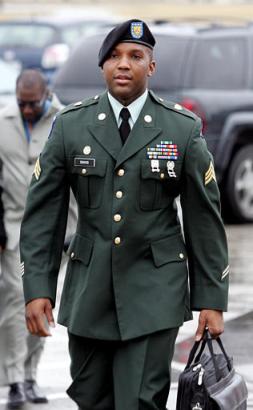 U.S. Army Sgt. Javal S. Davis arrives at the courthouse for a hearing in Fort Hood, Texas, Tuesday, Feb. 1, 2005. Davis is facing charges in connection with prisoner abuse at the Abu Ghraib prison in Iraq. [AP]