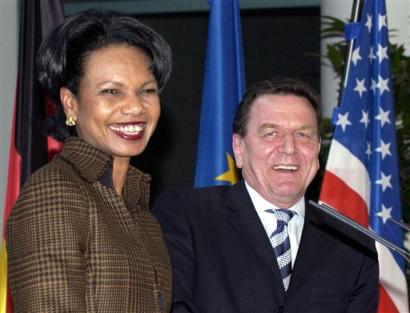 U.S. Secretary of State Condoleezza Rice, left, and German Chancellor Gerhard Schroeder answer reporters' questions during a news conference in Berlin on Friday, Feb. 4, 2005. Rice is on her first trip as Secretary of State to Europe and the Middle East. [AP]