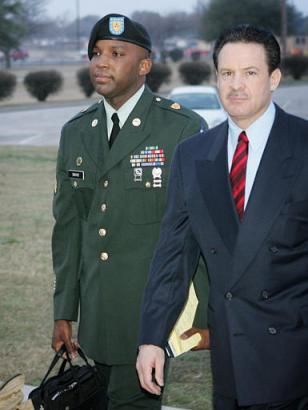 U.S. Army Sgt. Javal S. Davis, left, and attorney Paul Bergrin, arrive at the courthouse for Davis' sentencing hearing in Fort Hood, Texas, Friday, Feb. 4, 2005. Davis pleaded guilty to battery and two other charges in connection with the prisoner abuse scandal at the Abu Ghraib prison in Iraq. [AP]