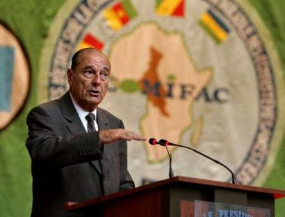 French President Jacques Chirac delivers a speech at the opening session of the second Central Africa heads of state summit on conservation and sustainable management of forests ecosystems in Brazzaville, February 5, 2005. REUTERS/Philippe Wojazer 