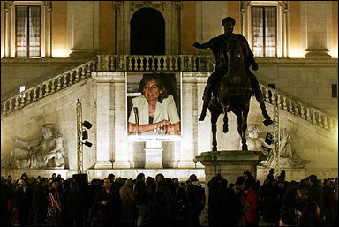 A giant poster showing Italian journalist Giuliana Sgrena is displayed on Capitoline hill, central Rome. Sgrena, 56, a correspondent for the leftist Il Manifesto daily, was abducted after visiting a mosque in Baghdad. [AFP]