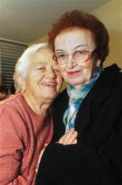 Sisters Hannah Katz, 78, left and Klara Blaier, 81, are seen in this photo made Saturday and released by Yad Vashem on Sunday Feb. 6, 2005. Katz and Blaier, two sisters who survived the Holocaust and moved separately to Israel in 1948, each unaware the other had survived, were reunited after 61 years with the help of a high-tech data base, a spokeswoman from the Israel Holocaust memorial said Sunday Feb. 6, 2005. (AP 