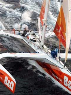 British sailor Ellen MacArthur is seen aboard her trimaran Castorama - B & Q during her solo round-the-world record attempt, Monday, Feb. 7, 2005, off the French coast of the Isle of Ouessant, western France. MacArthur is to break the current 72-day, 22-hour, 54-minute and 22-second record set by Francis Joyon. (AP 