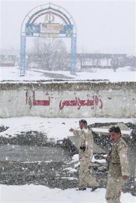 Border guards patrol in the snow at Bashmagh in the northern Kurdish area of Iraq Friday, Feb. 4, 2005. As the White House denies allegations that American spies are crossing into Iran from there to search for nuclear sites, it is clear that the border in the rugged northern Kurdish region of Iraq is plenty easy to navigate for those who know how. [AP]
