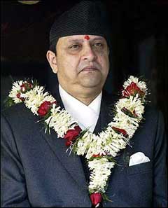 The US ambassador to Nepal has been asked to return to Washington for consultations the State Department said, two weeks after that country's King Gyanendra, seen here 13 February 2005, sacked the government, declared a state of emergency, and took absolute power(AFP