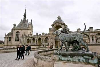 Visitors stroll outside the Castle of Chantilly, 50 kms north of Paris, Monday Feb. 14, 2005, where Brazilian soccer star Ronaldo will celebrate his love for model Daniella Cicarelli in a Valentine's Day party. Up to 250 guests were expected at the celebration for Ronaldo and Cicarelli's planned marriage. They will wed formally later this year. [AP]