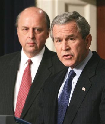 US President Bush announces the nation's first new national intelligence director, John Negroponte, left, a former U.S. ambassador to the United Nations, in a ceremony in the Eisenhower Executive Office Building at the the White House, Thursday, Feb. 17, 2005 in Washington. The director will oversee 15 separate intelligence agencies, including the CIA. [AP]