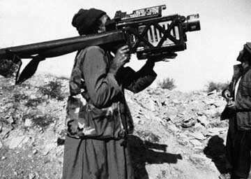 A mujahedeen rebel aims a U.S.-made Stinger missile near Gardez, Afghanistan, Dec. 1991. The State Department estimates that about 1 million shoulder-fired anti-aircraft missiles have been produced worldwide since the 1950s. The number believed to be in the hands of 'nonstate actors,' such as terrorist groups, is 'in the thousands,' the department says. [AP] 