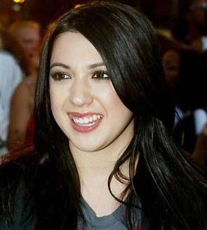 Singer Michelle Branch smiles as she arrives on the red carpet at the MuchMusic Video Awards in Toronto on June 22, 2003.[AP/file]