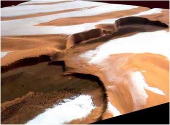 European Space Agency scientists think that there was and could even still be life on Mars and want a new European mission to the red planet to take samples, a conference heard on February 25, 2005 in Noordwijk, The Netherlands.This hand out image taken from the European Space Agency's Mars Express spacecraft shows the Martian north polar ice cap with layers of water, ice and dust for the first time in perspective view. This image shows cliffs which are almost two kilometres high, and the dark material in the caldera-like structures and dune fields could be volcanic ash. 