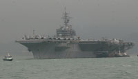 The USS Kitty Hawk strike group pulled into Hong Kong port on Friday to receive replenishments. [newsphoto]