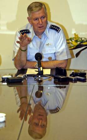 U.S. General Richard Myers, Chairman of the U.S. Joint Chiefs of Staff, gestures during a news conference in Amman, March 17, 2005. The U.S. armed forces senior commander said on Thursday insurgents were becoming less effective as attacks against U.S. troops in Iraq had dropped to levels seen almost a year ago. [Reuters]