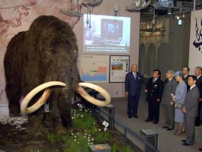 Japan's Emperor Akihito (3R), together with Empress Michiko (2R) and Crown Prince Naruhito (R), look at a life-size replica of a mammoth, on display at the 2005 World Exposition in Nagakute, near Nagoya, central Japan March 23, 2005. The 185-day Expo will open to public on March 25. REUTERS/Kaku Kurita/POOL