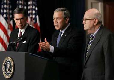 President George W. Bush speaks to reporters about findings of the president's commission on intelligence in a White House office building, March 31, 2005. U.S. intelligence on Iraq was 'dead wrong,' dealing a blow to American credibility that will take years to undo, and spymasters still know disturbingly little about nuclear programs in countries like Iran and North Korea, the presidential commission reported. Flanking Bush are committee leaders former Virginia Sen. Charles Robb(L) and appeals court judge Laurence Silberman. (Kevin Lamarque/Reuters) 