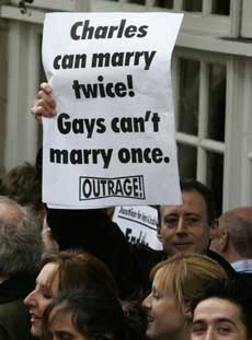 Gay rights activist Peter Tatchell protests before the civil wedding ceremony of Britain's Prince Charles and the Duchess of Cornwall at the Guildhall in Windsor, southern England, April 9, 2005. Prince Charles and his long-term partner Camilla married on Saturday in a low-key ceremony.