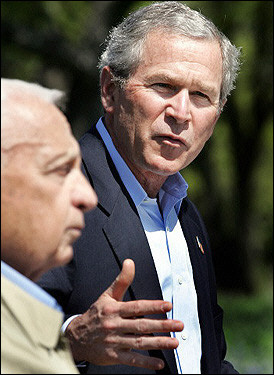 US President George W. Bush (R) and Israeli Prime Minister Ariel Sharon, seen here on April 11. US officials confirmed that Iran's nuclear ambitions were discussed by Bush and Sharon at their Texas summit.(AFP/File/Tim Sloan) 