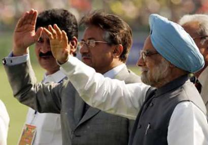 Pakistan's President Pervez Musharraf (2nd L) and Indian Prime Minister Manmohan Singh (R) wave to the crowd before the start of the sixth and final one-day international cricket match between India and Pakistan, in New Delhi April 17, 2005. Musharraf's visit was originally planned as an informal trip to watch India and Pakistan play cricket on Sunday, but has taken on the air of a summit although both sides shy away from calling it one. (Kamal Kishore/Reuters) 