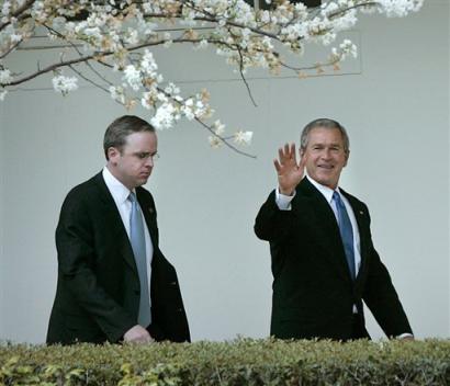 President Bush walks with Dan Bartlett, senior counselor to the president, along the colonade of the White House, Monday, April 18, 2005, in Washington. Bush spent the day in South Carolina promoting his Social Security reform agenda.(AP
