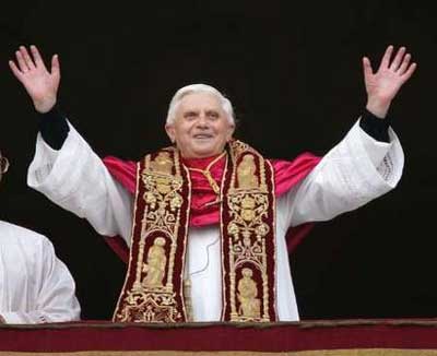 Pope Benedict XVI, Cardinal Joseph Ratzinger of Germany, waves from a balcony of St. Peter's Basilica in the Vatican after being elected by the conclave of cardinals, April 19, 2005. German Cardinal Joseph Ratzinger, the strict defender of Catholic orthodoxy for the past 23 years, was elected Pope on Tuesday despite a widespread assumption he was too old and divisive to win election.