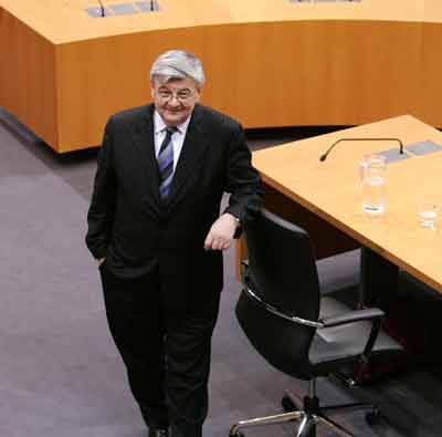 German Foreign Minister Joschka Fischer looks up during a break of a parliamentary inquiry commission hearing in Berlin April 25, 2005. Fischer took responsibility on Monday for lax visa policies that allowed waves of criminals into Germany, as he began testifying in a scandal that has hurt the government and his own standing. [Reuters]