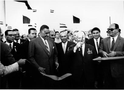 Soviet Premier Nikita Khrushchev cuts the ribbon to open the first stage of the Russian-financed High Dam at Aswan, Egypt, as Egyptian President Gamal Abdal Nasser, front row, second left looks on in this May 14, 1964 file photo Vladimir Putin on Tuesday April 26, 2005 makes his first visit to the Middle East as Russia's president, becoming the first Russian or Soviet leader in over 40 years to make an official state visit to Egypt, a one-time close ally of the former Soviet Union. (AP Photo/File) 
