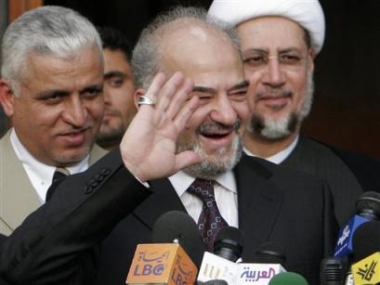 Iraqi Prime Minister-designate Ibrahim al-Jaafari gestures during a news briefing at his headquarters in Baghdad, Iraq, Wednesday, April 27, 2005 while announcing that he submitted to the presidential council a proposal for a broad-based Cabinet. Al-Jaafari did not release any of the names on the list, but said it included representatives of all the country's major groups, including Shiite and Sunni Arabs. (AP 