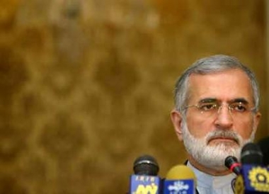 Iran will restart its uranium enrichment program if talks with European Union heavyweights France, Britain and Germany fail on Friday, Foreign Minister Kamal Kharrazi said April 28, 2005. Kharrazi speaks with the media after meeting his Danish counterpart Per Stig Moeller in Tehran, April 11. [Reuters]