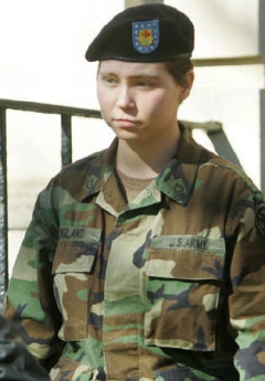 .S. Army P Lynndie England seen leaving a Fort Bragg courtroom during a break in her pre-trial hearing on charges of abusing inmates at Baghdad's Abu Ghraib prison, in near Fayetteville, North Carolina, in this December 2004 file photo. REUTERS