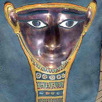 A 2,300-year old mummy is displayed after it was found by the Sakkara pyramids south of Cairo, May 3, 2005. Egyptian antiquities officials say the mummy is possibly the "most beautiful" found so far. They believe more mummies may be found in the same area. [Reuters]