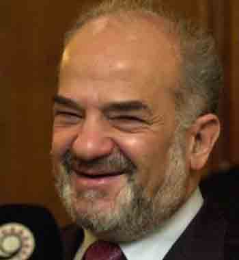 Iraqi Prime Minister Ibrahim al-Jaafari smiles as he announces that Iraqi political leaders have agreed who will fill five vacant cabinet ministries and one of two deputy prime minister's slots in the new democratically elected government, at his offiice in Baghdad, Iraq, Saturday, May 7, 2005. (AP