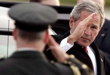 U.S. President George W. Bush salutes a soldier after arriving at Maastricht Aachen airport in the Southern Netherlands, May 7, 2005. Bush is travelling to Latvia, The Netherlands, Russia and Georgia on his five-day trip abroad. Photo by Jerry Lampen/Reuters