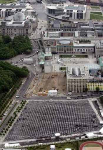 Aerial view of the Holocaust memorial in Berlin after the opening ceremony on Tuesday, May 10, 2005. 2,751 concrete slabs on a plot of land the size of two football fields form the Holocaust memorial designed by U.S. architect Peter Eisenman. In the background top left is the German parliament Reichstag. (AP