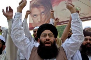 Pakistani protestors chant anti-U.S. slogans during a rally in Lahore May 12, 2005. They protested on Thursday over a recent magazine report that U.S. interrogators in Guantanamo Bay had desecrated the Koran. REUTERS