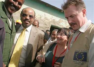 Ethiopia's Prime Minister Meles Zenawi, second from left, meet with European Union election observer's after casting his vote, Sunday, May 15, 2005 in his native village of Adwa some 1,000 kilometers north of the capital, Addis Ababa.Turnout was high Sunday as Ethiopian voters went to the polling station during the third democratic elections in Ethiopia's 3,000-year history(AP