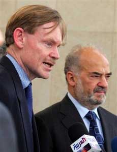 US Deputy Secretary of State Robert Zoellick, left, speaks during a joint press conference with Iraqi Prime Minister Ibrahim al-Jaafari, right, in Baghdad's fortified 'Green Zone' Thursday, May 19, 2005. Zoellick is on one-day visit to Iraq, coming at a time of rising sectarian tension between majority Shiite and minority Sunni Arabs. (AP