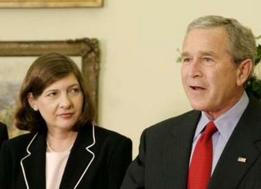 .S. President George W. Bush makes remarks with judicial nominee, Priscilla Owen (L), in the Oval Office at the White House in Washington, May 24, 2005. 