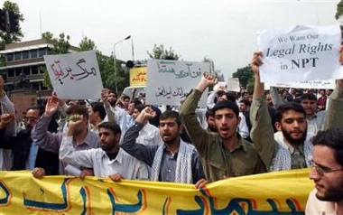 Some 200 Iranian students stage a demonstration in front of the British Embassy in Tehran on Wednesday May, 25, 2005, to support Iran's nuclear program. Iranian negotiators held talks on Wednesday with the foreign ministers from France, Britain and Germany and EU foreign policy chief Javier Solana.(AP