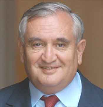 French Prime Minister Jean-Pierre Raffarin smiles as he leaves the Matignon hotel, the prime minister's offices, after receiving cabinet ministers in Paris Monday. In a stunning rejection of the European Union's latest ambitious move to unite its 25 nations, French voters shot down the bloc's first constitution, dealing a potentially fatal blow to the charter and humiliating President Jacques Chirac. Raffarin is widely seen as the most obvious victim of any cabinet shuffle. (AP