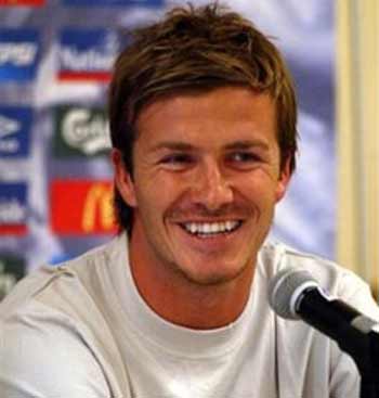 English Real Madrid soccer player David Beckham smiles during a news conference in New York, Monday, May 30, 2005. England plays Colombia in an exhibition match on Tuesday. (AP