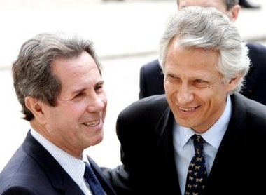 Newly named French Prime Minister Dominique de Villepin, right, is greeted by National Assembly speaker Jean-Louis Debre before a luncheon with parliamentarians at the National Assembly in Paris Tuesday, May 31, 2005. 
