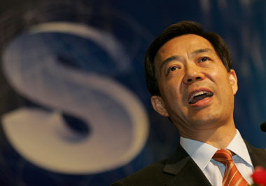 Chinese Minister of Commerce Bo Xilai speaks at the Forum on World Trade in Services in Shanghai, China, June 9, 2005. China will protect the rights of its industry in talks with the U.S. and the E.U. over surging textile exports, Bo said on Thursday. 