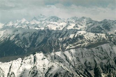 An aerial view of mountains is seen around Kargil, India, Saturday, June 11, 2005. The Indian Prime Minister Manmohan Singh is on a three-day visit to the remote Ladakh district in northwest Kashmir that began Friday to inaugurate two-power projects and to interact with Indian soldiers at Siachen, the world's highest battlefield. (AP 